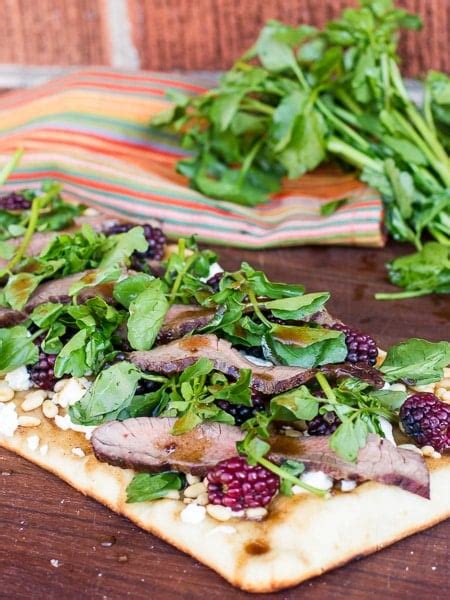 How does Grilled Flank Steak Flatbread fit into your Daily Goals - calories, carbs, nutrition