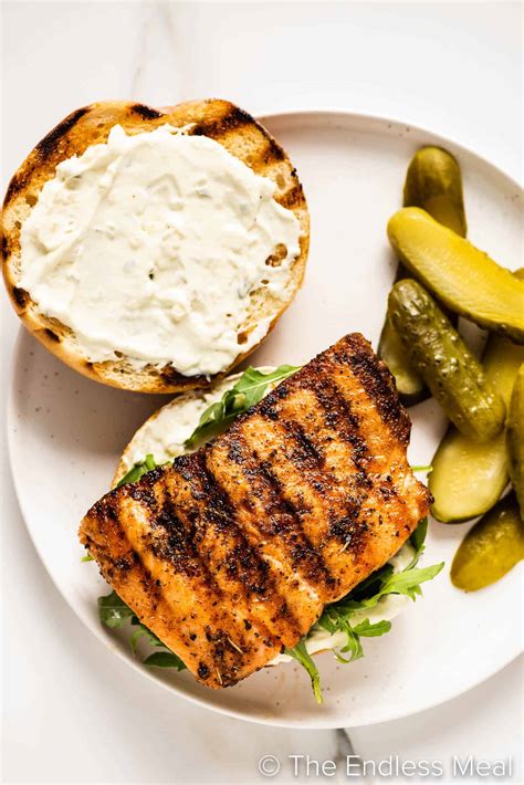 How does Grilled Salmon Sandwich with White Bun fit into your Daily Goals - calories, carbs, nutrition