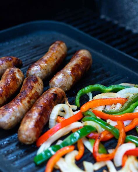 How does Grilled Sausage with Peppers Onions fit into your Daily Goals - calories, carbs, nutrition