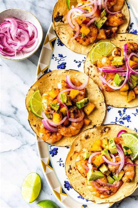 How does Grilled Shrimp Tacos with Sauteed Veggies Chips withSalsa fit into your Daily Goals - calories, carbs, nutrition