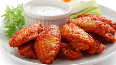 How does Grilled Spicy Buffalo Chicken Wings fit into your Daily Goals - calories, carbs, nutrition