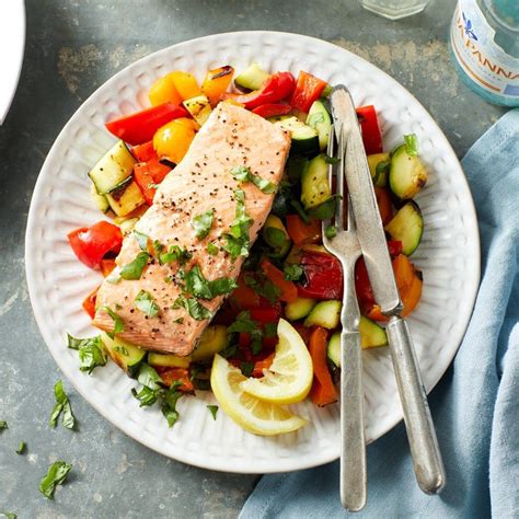 How does Grilled Sweet Chilli Salmon with Mediterranean Vegetables & Cous Cous fit into your Daily Goals - calories, carbs, nutrition