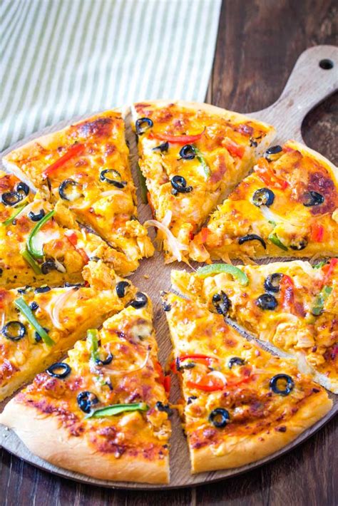 How does Grilled Tandoori Chicken Pizza fit into your Daily Goals - calories, carbs, nutrition