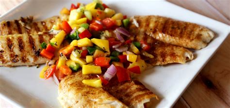 How does Grilled Tilapia with Tropical Fruit Salsa fit into your Daily Goals - calories, carbs, nutrition