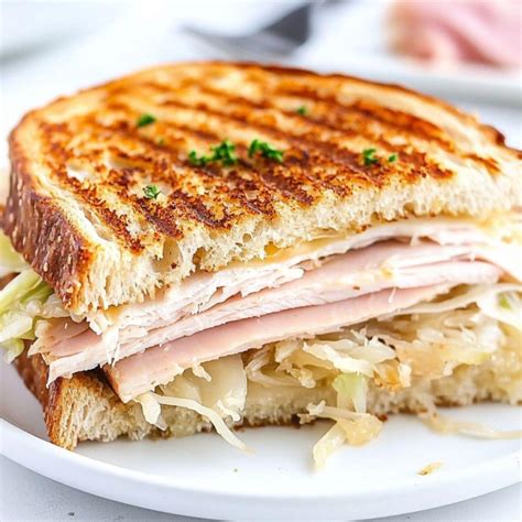 How does Grilled Turkey Reuben fit into your Daily Goals - calories, carbs, nutrition
