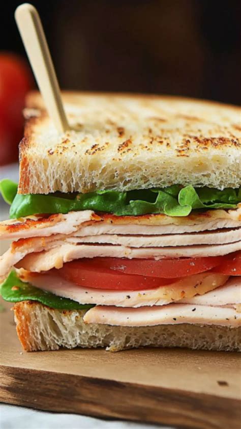 How does Grilled Turkey and Cheddar Sandwich fit into your Daily Goals - calories, carbs, nutrition