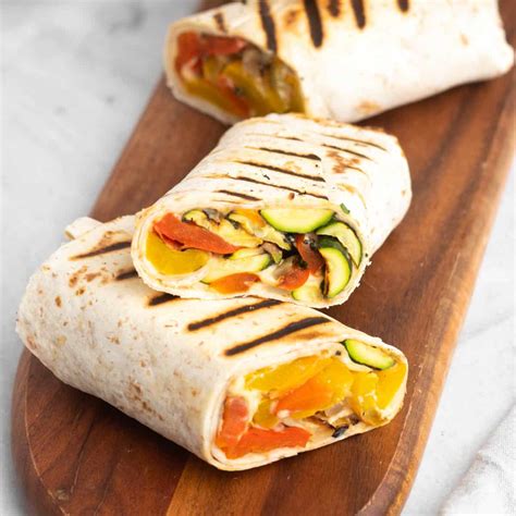 How does Grilled Vegetable and Provolone Wrap fit into your Daily Goals - calories, carbs, nutrition