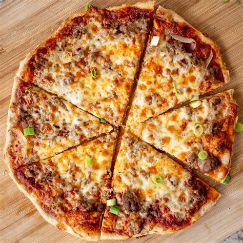 How does Ground Beef Pizza fit into your Daily Goals - calories, carbs, nutrition