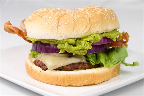 How does Guacamole Bacon Cheeseburger fit into your Daily Goals - calories, carbs, nutrition