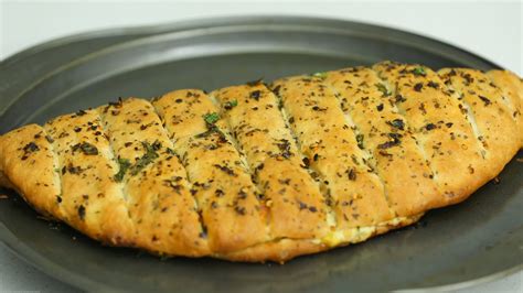 How does Half Moon Cheesy Bread fit into your Daily Goals - calories, carbs, nutrition