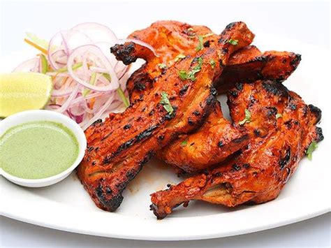 How does Half Tandoori Style Halal Chicken fit into your Daily Goals - calories, carbs, nutrition