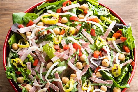 How does Ham Provolone Wrap withTriple Bean Salad fit into your Daily Goals - calories, carbs, nutrition