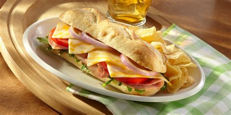 How does Ham and Cheddar Toasted Sub fit into your Daily Goals - calories, carbs, nutrition