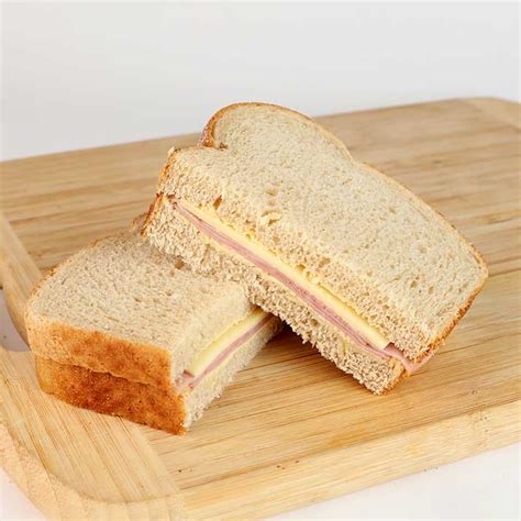 How does Ham and Cheddar on Sourdough (15692.0) fit into your Daily Goals - calories, carbs, nutrition