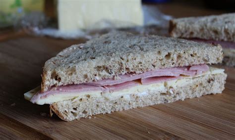 How does Ham and Cheese Sandwich on Wheat Bread fit into your Daily Goals - calories, carbs, nutrition
