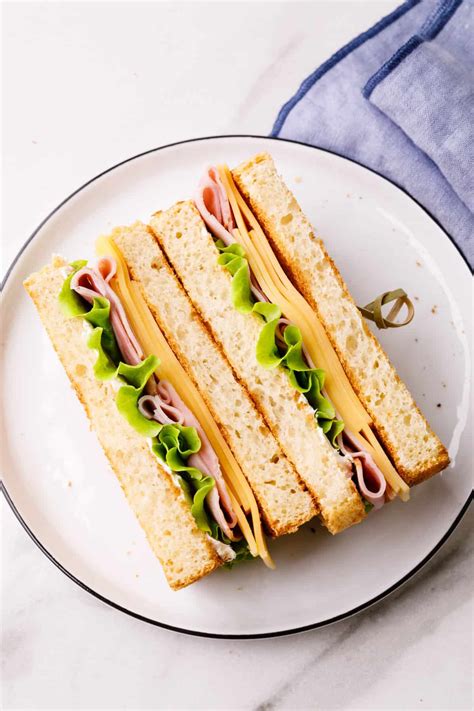 How does Ham and Cheese Sandwich on White Bread fit into your Daily Goals - calories, carbs, nutrition