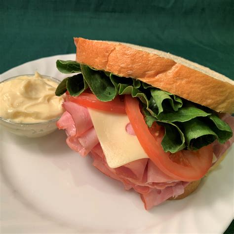 How does Ham and Swiss Cheese Sandwich fit into your Daily Goals - calories, carbs, nutrition