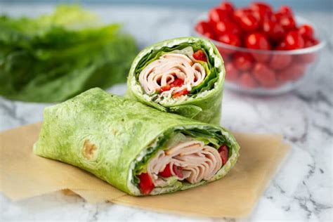 How does Ham and Turkey Ranch Wrap Boxed Lunch fit into your Daily Goals - calories, carbs, nutrition