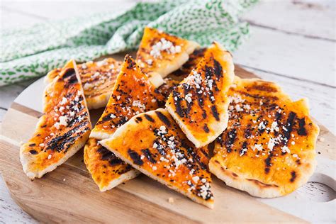 How does Harissa Chicken Flatbread fit into your Daily Goals - calories, carbs, nutrition