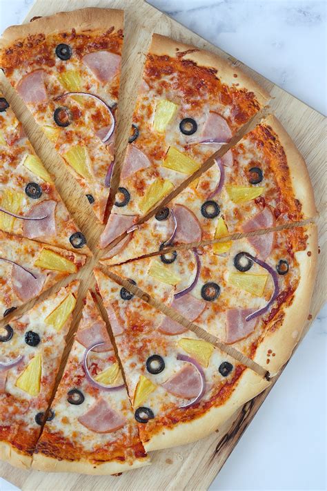 How does Hawaiian Pizza, 1/8 Slice fit into your Daily Goals - calories, carbs, nutrition