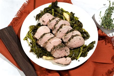 How does Herb-Roasted Pork Tenderloin with Bartlett Pears and Broccoli Rabe fit into your Daily Goals - calories, carbs, nutrition