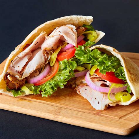 How does Honey Mustard Turkey Pita Sandwich fit into your Daily Goals - calories, carbs, nutrition