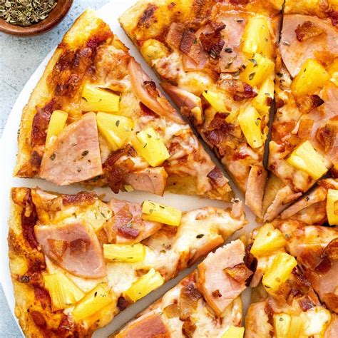 How does Honolulu Grilled Pineapple Bacon Pizza fit into your Daily Goals - calories, carbs, nutrition