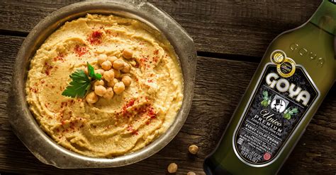 How does Hummus Olive Oil 2 oz fit into your Daily Goals - calories, carbs, nutrition