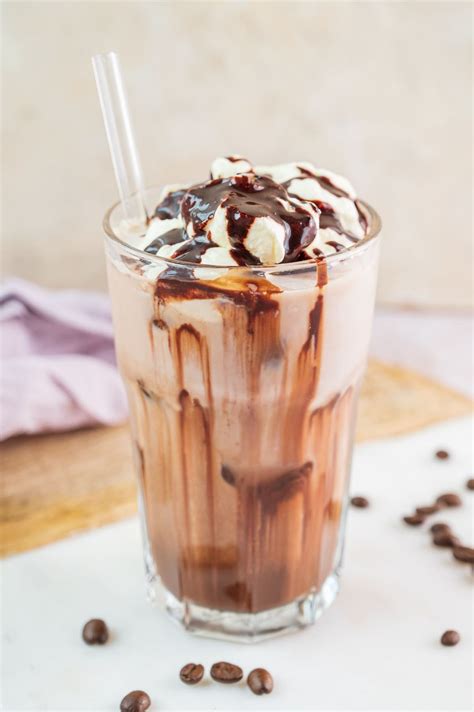 How does Iced Caffe Mocha - Venti - Soy Milk - With Whipped Cream fit into your Daily Goals - calories, carbs, nutrition