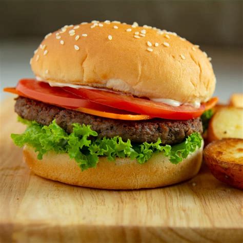 How does Impossible Vegan Burger (84521.11) fit into your Daily Goals - calories, carbs, nutrition
