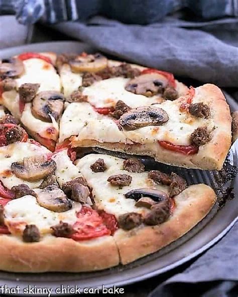 How does Individual 7 - Sausage and Mushroom Pizza fit into your Daily Goals - calories, carbs, nutrition