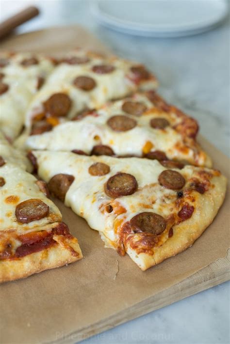 How does Italian Sausage Pizza Wheat Crust fit into your Daily Goals - calories, carbs, nutrition