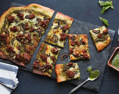 How does Italian Sausage and Pesto Pizza fit into your Daily Goals - calories, carbs, nutrition