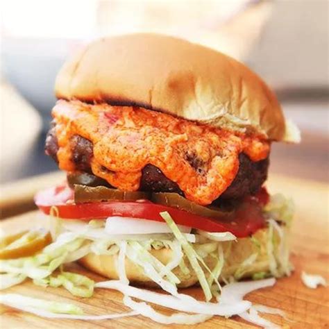 How does Jalapeno Cheeseburger fit into your Daily Goals - calories, carbs, nutrition