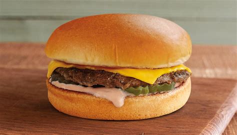 How does Junior Cheeseburger on Bun fit into your Daily Goals - calories, carbs, nutrition