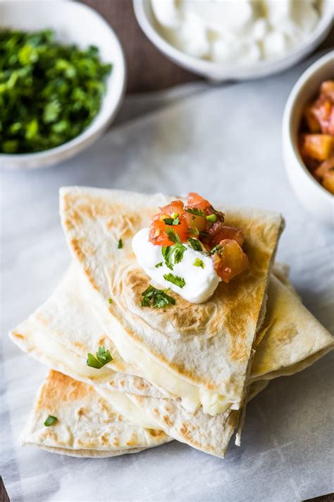 How does Kids Cheddar Cheese Quesadilla on a Whole Wheat Tortilla fit into your Daily Goals - calories, carbs, nutrition