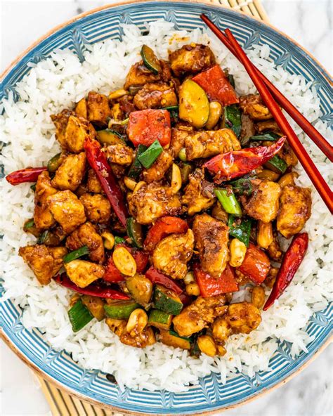 How does Kung Pao Chicken over Sticky Rice with Stir-Fried Sugar Snap Peas fit into your Daily Goals - calories, carbs, nutrition