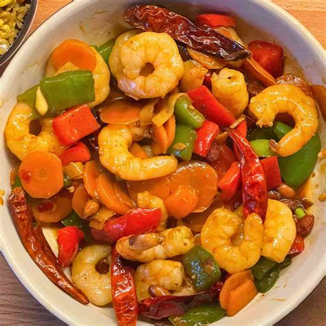 How does Kung Pao Shrimp & Scallops with Rice fit into your Daily Goals - calories, carbs, nutrition