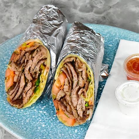 How does Lamb Gyro on Pita Wrap fit into your Daily Goals - calories, carbs, nutrition