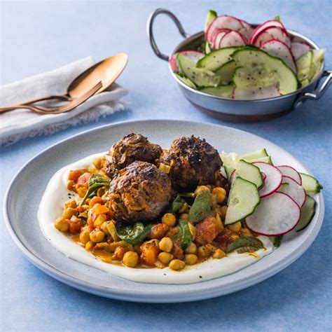 How does Lamb Koftas with Tarka Dhal & Naan Bread fit into your Daily Goals - calories, carbs, nutrition