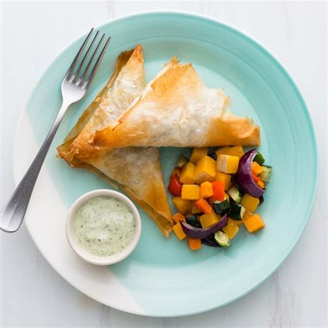 How does Lamb and Stilton Filo Wrap with Roasted Vegetables fit into your Daily Goals - calories, carbs, nutrition