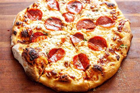 How does Large Pepperoni Pizza fit into your Daily Goals - calories, carbs, nutrition