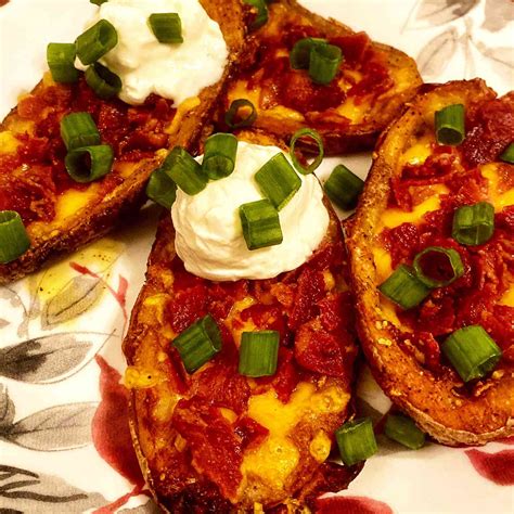 How does Loaded Chili Cheese Potato Skins (1) fit into your Daily Goals - calories, carbs, nutrition