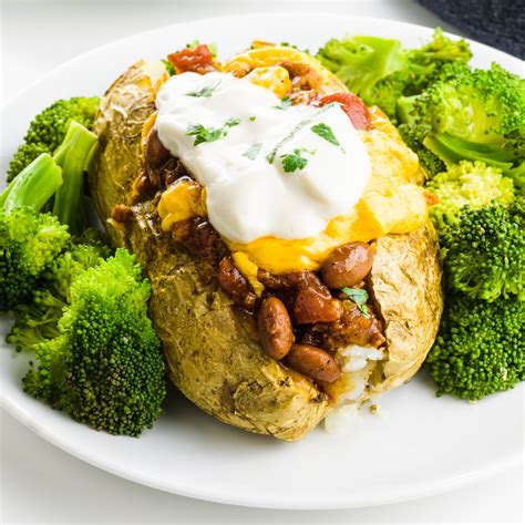 How does Loaded Veggie Bacon Baked Potato (553.11) fit into your Daily Goals - calories, carbs, nutrition