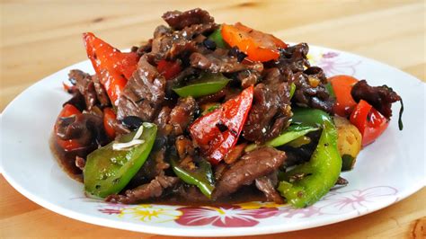 How does Locally Source Irish Beef Strips in a Chinese Black Bean Sauce and served with Steamed Rice fit into your Daily Goals - calories, carbs, nutrition