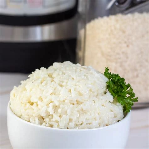 How does Long Grain White Rice Cooked fit into your Daily Goals - calories, carbs, nutrition