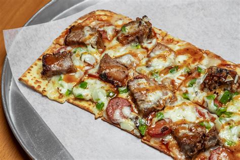 How does Longhorn Beef Flatbread fit into your Daily Goals - calories, carbs, nutrition