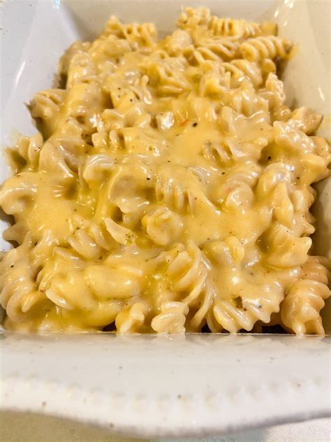 How does Macaroni And Cheese - Side Dishes - Deluxe Rotini & White Cheddar Sauce With Broccoli fit into your Daily Goals - calories, carbs, nutrition