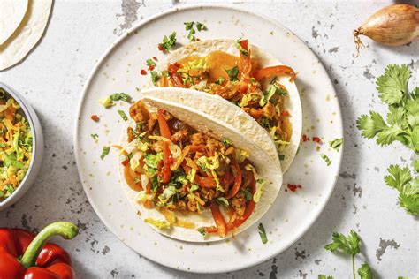How does Mango Chicken Wrap fit into your Daily Goals - calories, carbs, nutrition