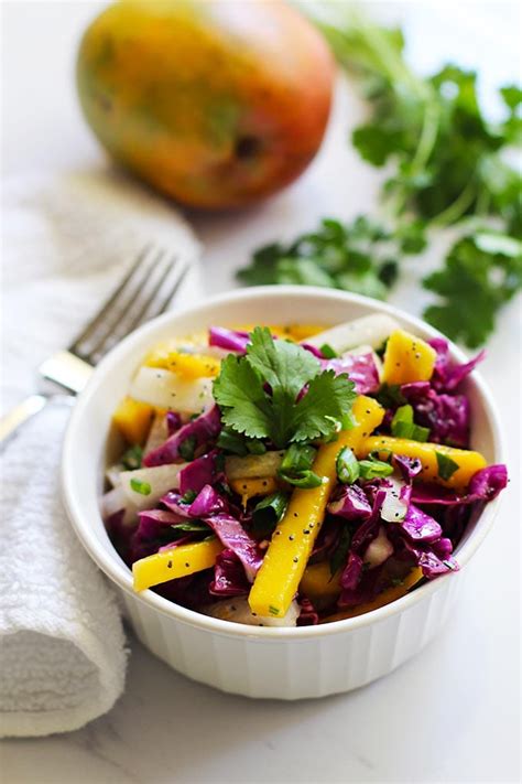 How does Mango Jicama Slaw with Onions Cabbage and Cilantro (111851.0) fit into your Daily Goals - calories, carbs, nutrition